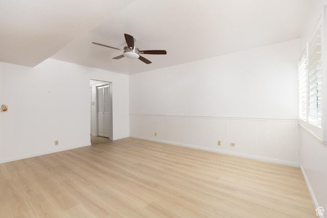 1525 E Waterbury Dr Unit D, Salt Lake City, UT 84121 - spare room with a ceiling fan, light wood finished floors, and baseboards