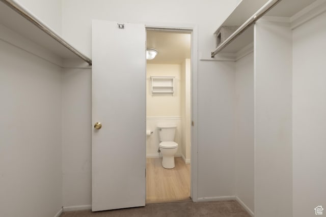 1525 E Waterbury Dr Unit D, Salt Lake City, UT 84121 - spacious closet featuring carpet