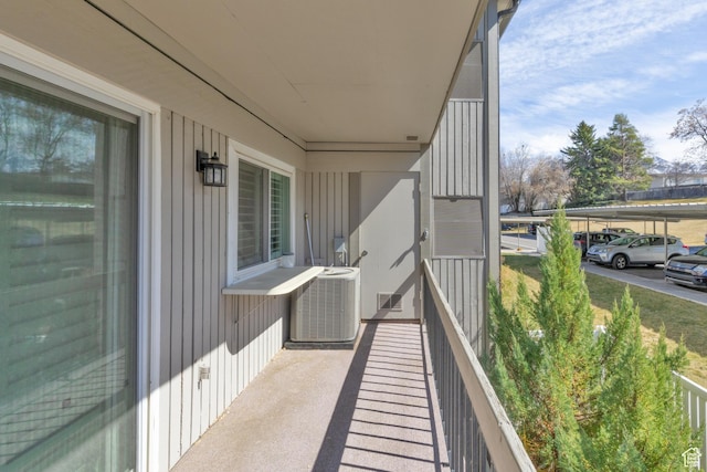 1525 E Waterbury Dr Unit D, Salt Lake City, UT 84121 - balcony featuring central air condition unit