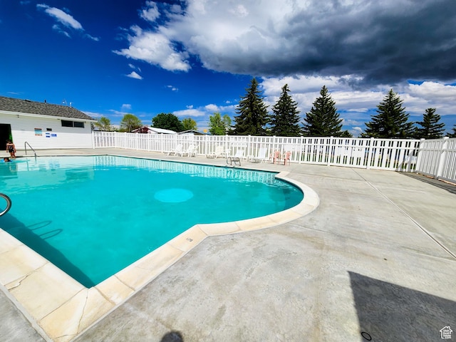 3030 S Edgemont Dr Unit 159, Garden City, UT 84028 - pool featuring a patio and fence