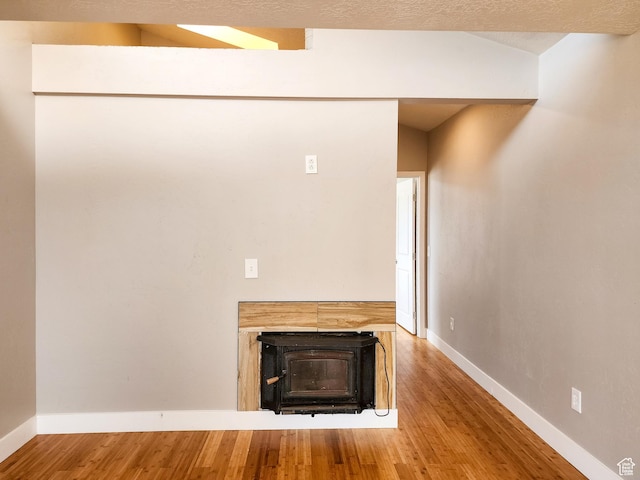 3030 S Edgemont Dr Unit 159, Garden City, UT 84028 - interior space with wood finished floors, baseboards, and a textured ceiling