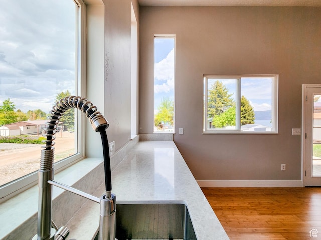 3030 S Edgemont Dr Unit 159, Garden City, UT 84028 - room details featuring baseboards and wood finished floors