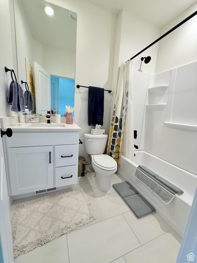 bathroom with tile patterned flooring, toilet, vanity, and shower / bath combination with curtain