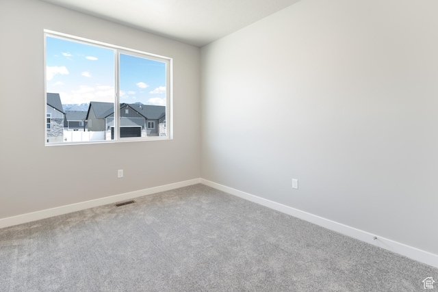 3077 N 2875 W Unit 5, Plain City, UT 84404 - carpeted empty room featuring baseboards and visible vents
