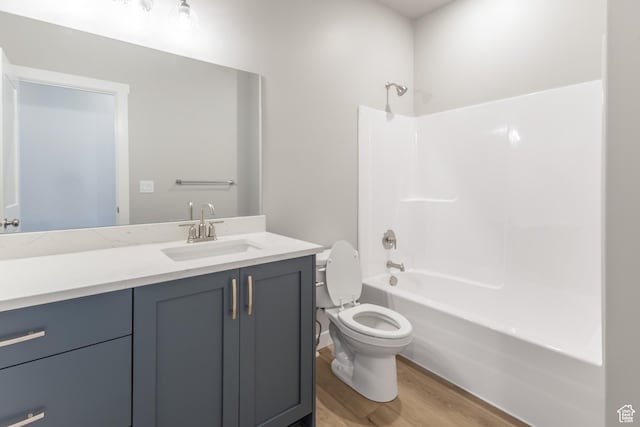 3077 N 2875 W Unit 5, Plain City, UT 84404 - bathroom with vanity, toilet, shower / tub combination, and wood finished floors
