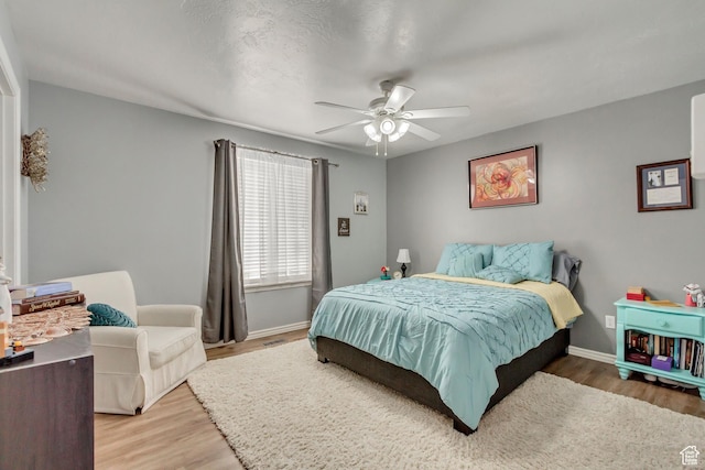 817 W Lucky Clover Ln, Murray, UT 84123 - bedroom with ceiling fan, visible vents, baseboards, and wood finished floors