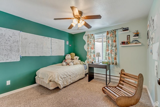 817 W Lucky Clover Ln, Murray, UT 84123 - bedroom with baseboard heating, ceiling fan, baseboards, and carpet