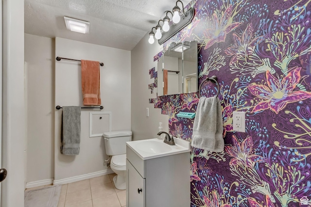 817 W Lucky Clover Ln, Murray, UT 84123 - bathroom featuring tile patterned floors, toilet, a textured ceiling, baseboards, and vanity