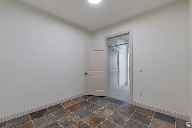 6264 W Skyline Dr N, Highland, UT 84003 - unfurnished room with baseboards and stone finish floor