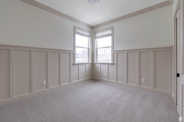 6264 W Skyline Dr N, Highland, UT 84003 - carpeted empty room with ornamental molding, visible vents, a decorative wall, and wainscoting