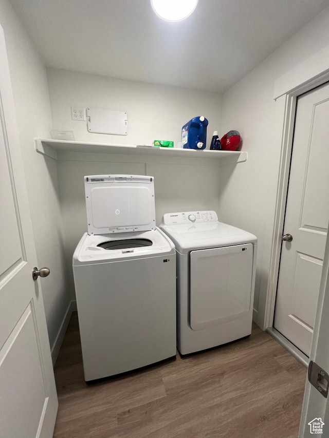 933 N 960 W Street W W 4, Tremonton, UT 84337 - washroom with separate washer and dryer, wood finished floors, and laundry area