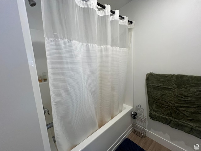 933 N 960 W Street W W 4, Tremonton, UT 84337 - full bathroom featuring shower / tub combo with curtain and wood finished floors