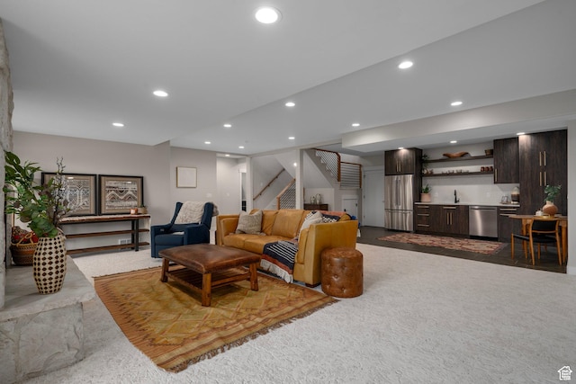 915 Farrell Farm Cir, Midway, UT 84049 - living room with recessed lighting, wet bar, stairs, and dark carpet