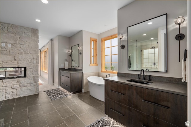 915 Farrell Farm Cir, Midway, UT 84049 - full bath with a shower stall, a freestanding tub, two vanities, and a sink