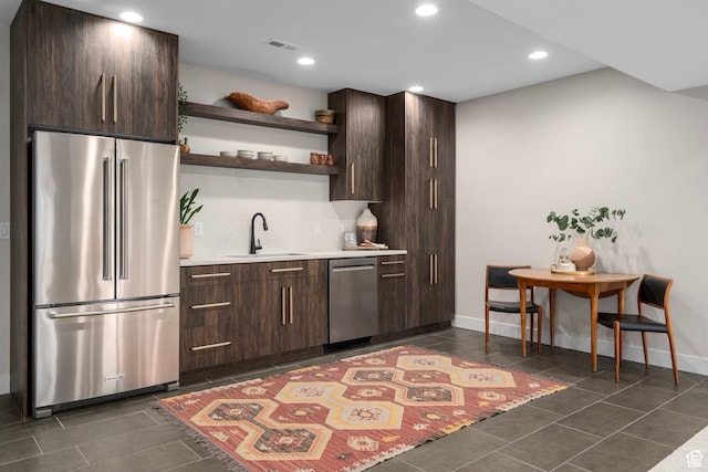 915 Farrell Farm Cir, Midway, UT 84049 - kitchen with open shelves, dark brown cabinets, appliances with stainless steel finishes, and a sink