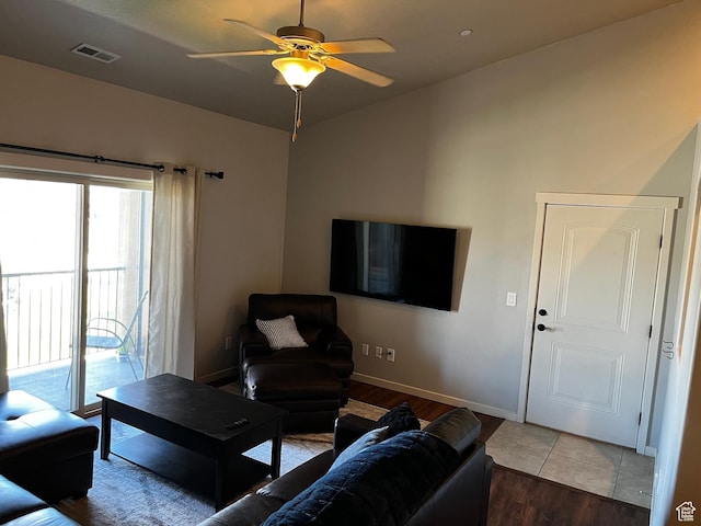 223 E Jordan Ridge Blvd Unit 110, Saratoga Springs, UT 84045 - living area featuring wood finished floors, a ceiling fan, visible vents, and baseboards