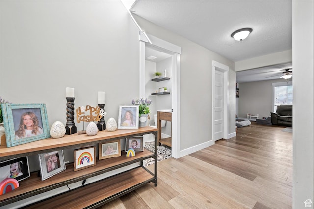 1490 N 4925 W, Plain City, UT 84404 - corridor with a textured ceiling, baseboards, and light wood-style floors