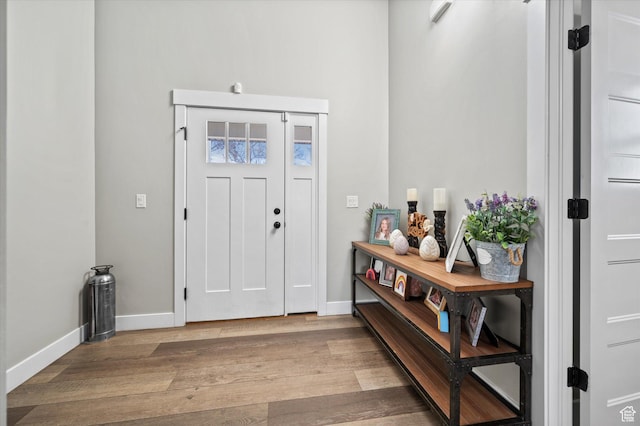 1490 N 4925 W, Plain City, UT 84404 - foyer featuring baseboards and wood finished floors