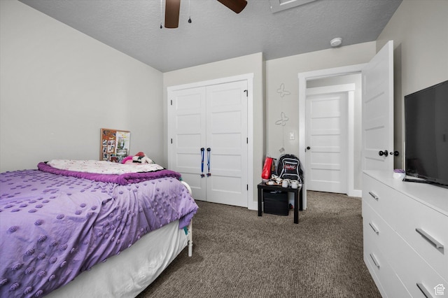 1490 N 4925 W, Plain City, UT 84404 - bedroom featuring a ceiling fan, a closet, dark carpet, and a textured ceiling
