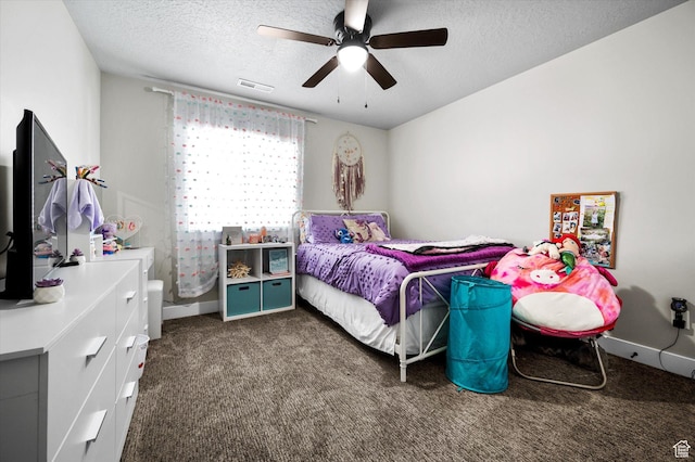 1490 N 4925 W, Plain City, UT 84404 - bedroom featuring a ceiling fan, baseboards, a textured ceiling, and dark carpet
