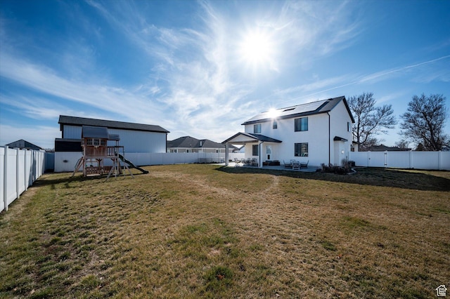 1490 N 4925 W, Plain City, UT 84404 - view of yard featuring a patio area, a playground, and a fenced backyard