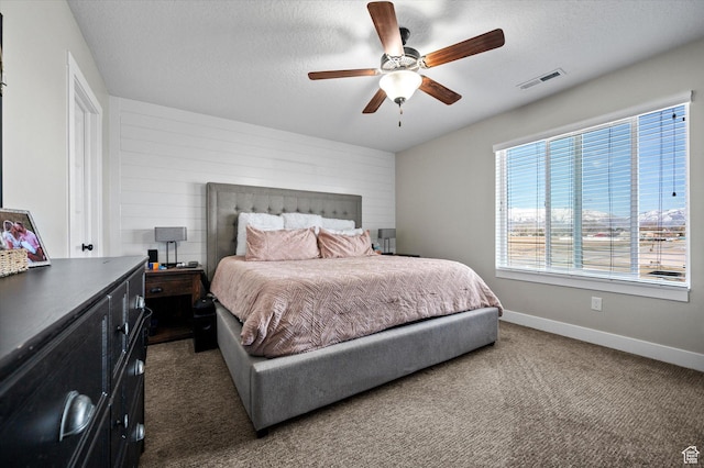1490 N 4925 W, Plain City, UT 84404 - bedroom featuring baseboards, visible vents, dark colored carpet, and a textured ceiling