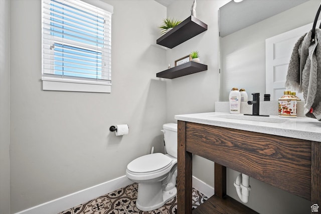1490 N 4925 W, Plain City, UT 84404 - bathroom featuring vanity, toilet, and baseboards