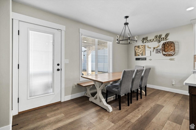1490 N 4925 W, Plain City, UT 84404 - dining space featuring baseboards, a notable chandelier, and wood finished floors