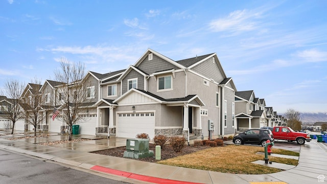 1606 N 4230 W, Lehi, UT 84043 - view of front facade featuring a residential view, stucco siding, a garage, stone siding, and driveway
