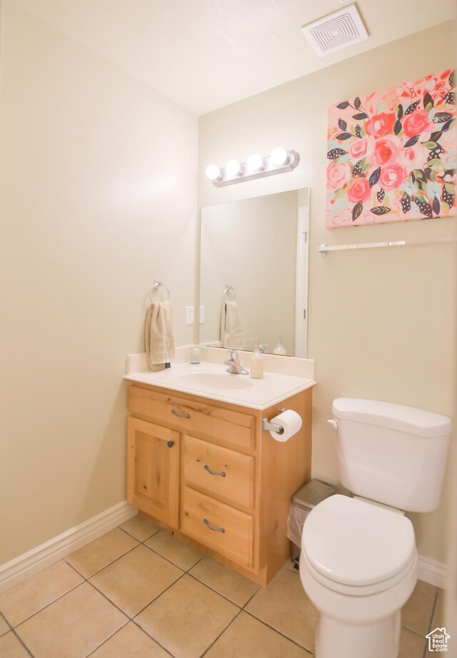 3131 E River Bottoms Rd S, Spanish Fork, UT 84660 - bathroom featuring visible vents, baseboards, toilet, tile patterned floors, and vanity
