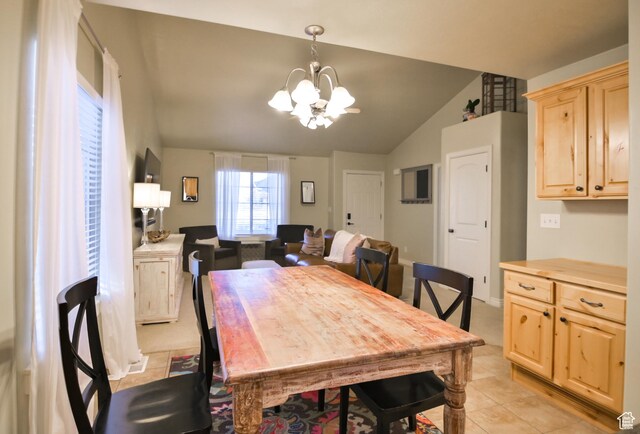 3131 E River Bottoms Rd S, Spanish Fork, UT 84660 - dining space featuring light tile patterned flooring, a notable chandelier, and vaulted ceiling