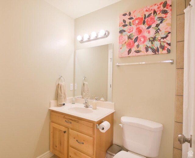 3131 E River Bottoms Rd S, Spanish Fork, UT 84660 - bathroom featuring toilet, vanity, and baseboards