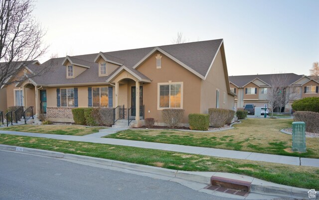 3131 E River Bottoms Rd S, Spanish Fork, UT 84660 - view of front of house featuring stucco siding and a front yard