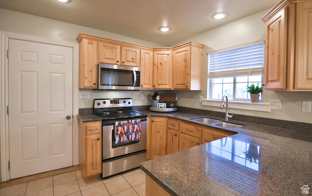 3131 E River Bottoms Rd S, Spanish Fork, UT 84660 - kitchen featuring a sink, light brown cabinetry, appliances with stainless steel finishes, light tile patterned floors, and recessed lighting