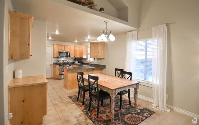 3131 E River Bottoms Rd S, Spanish Fork, UT 84660 - dining space featuring light tile patterned flooring, baseboards, and an inviting chandelier