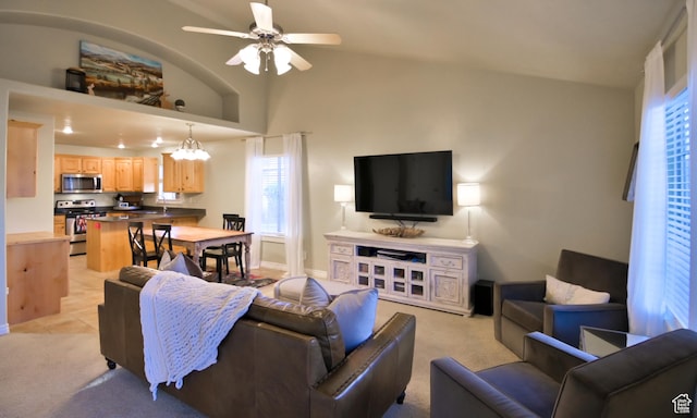 3131 E River Bottoms Rd S, Spanish Fork, UT 84660 - living room with a ceiling fan, light carpet, and vaulted ceiling