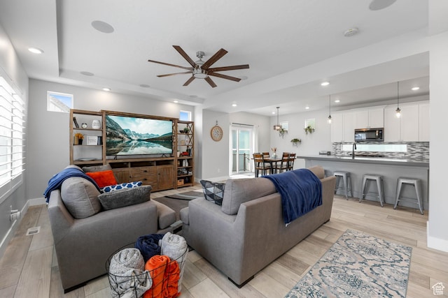 53 E Polaris Dr, Saratoga Springs, UT 84045 - living area featuring recessed lighting, baseboards, light wood-style floors, and a ceiling fan