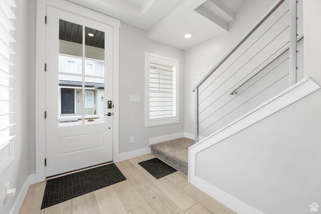 53 E Polaris Dr, Saratoga Springs, UT 84045 - entrance foyer with light wood-type flooring, stairs, and baseboards
