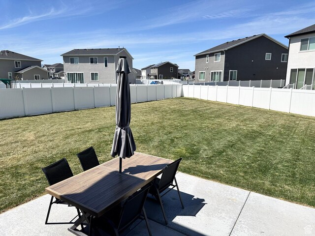 198 W Box Creek Dr, Stansbury Park, UT 84074 - exterior space with a residential view, outdoor dining space, and fence