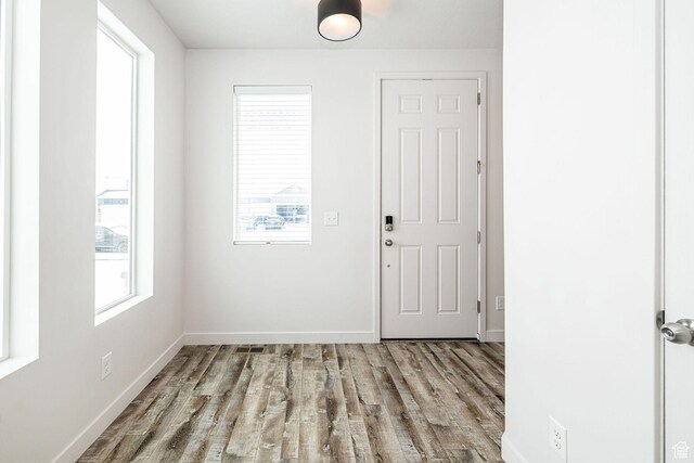 198 W Box Creek Dr, Stansbury Park, UT 84074 - foyer entrance featuring baseboards and wood finished floors