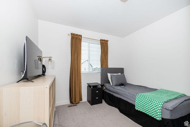 198 W Box Creek Dr, Stansbury Park, UT 84074 - bedroom with light colored carpet, baseboards, and visible vents