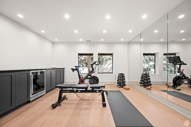2651 E Hiawatha Cir, Salt Lake City, UT 84108 - exercise area with wine cooler, recessed lighting, light wood-type flooring, and baseboards
