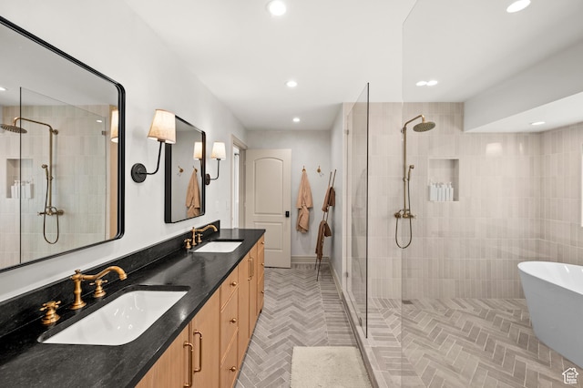 2651 E Hiawatha Cir, Salt Lake City, UT 84108 - bathroom with a sink, tiled shower, and recessed lighting