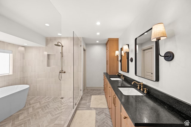 2651 E Hiawatha Cir, Salt Lake City, UT 84108 - bathroom featuring double vanity, recessed lighting, tiled shower, and a sink