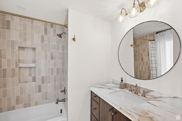 2651 E Hiawatha Cir, Salt Lake City, UT 84108 - bathroom featuring a notable chandelier, vanity, and shower / bathing tub combination