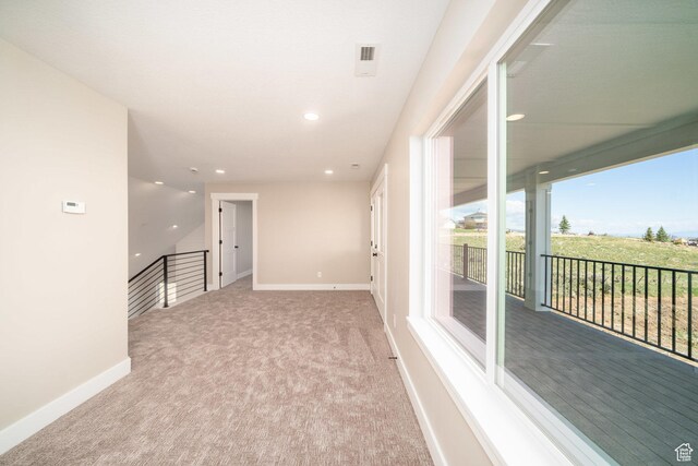 2678 S Eagle Dr Unit 12, Garden City, UT 84028 - spare room featuring baseboards, carpet flooring, and recessed lighting