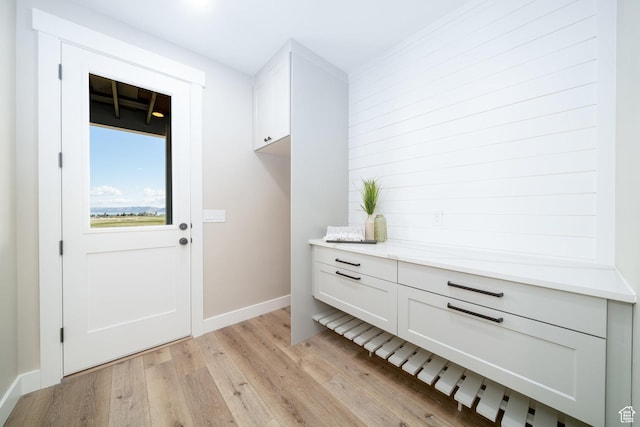 2678 S Eagle Dr Unit 12, Garden City, UT 84028 - doorway to outside with light wood finished floors and baseboards