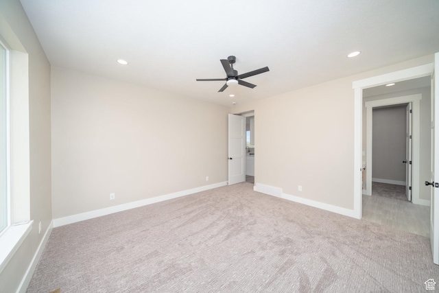 2678 S Eagle Dr Unit 12, Garden City, UT 84028 - unfurnished bedroom featuring light carpet, baseboards, and recessed lighting