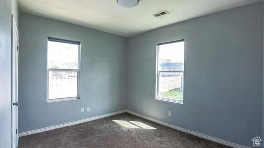 11 W Robert Ave, South Salt Lake, UT 84115 - spare room with plenty of natural light, baseboards, and carpet flooring