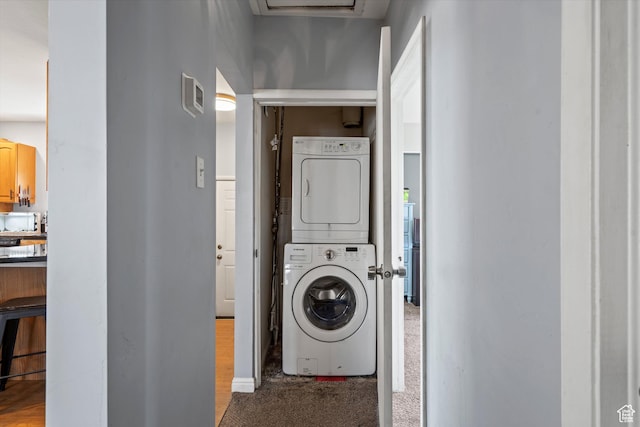 11 W Robert Ave, South Salt Lake, UT 84115 - laundry area with stacked washer / dryer and carpet floors